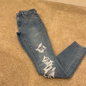 American eagle ripped blue jeans
